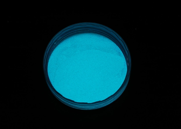 glowing blue powder